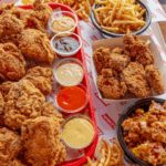 Crispy golden vegetarian fritters with fries at Best Restaurant in Karnal