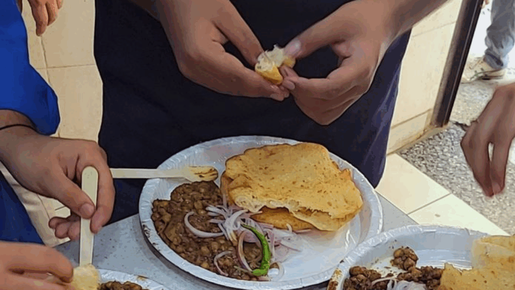 people eating Chole Bhature as a favourite comfort food at zaikastreet.