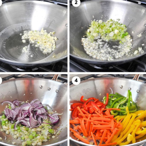 colorful vegetables being stir fried in a wok for Hakka Noodles at zaikastreet