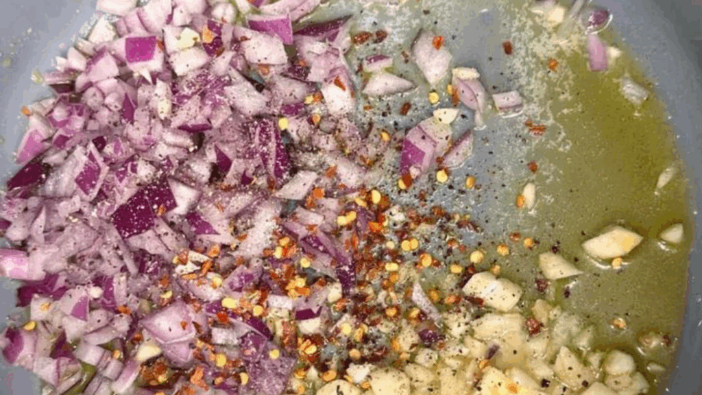 sautering onion and ginger garlic for pav bhaji at zaikastreet